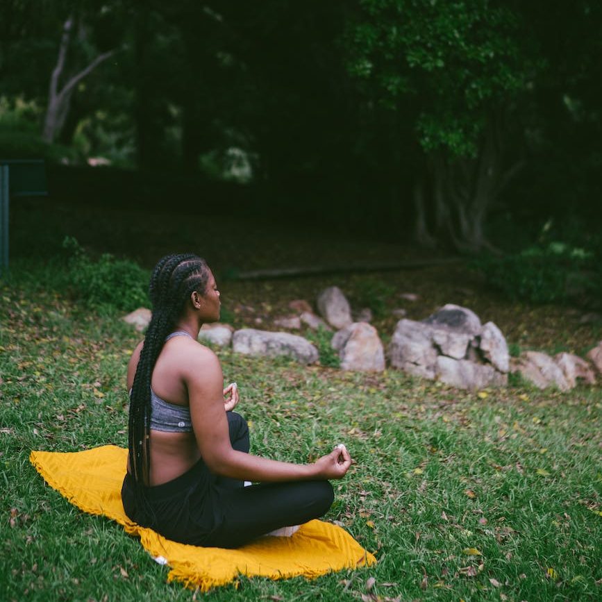 photo of woman doing meditation
