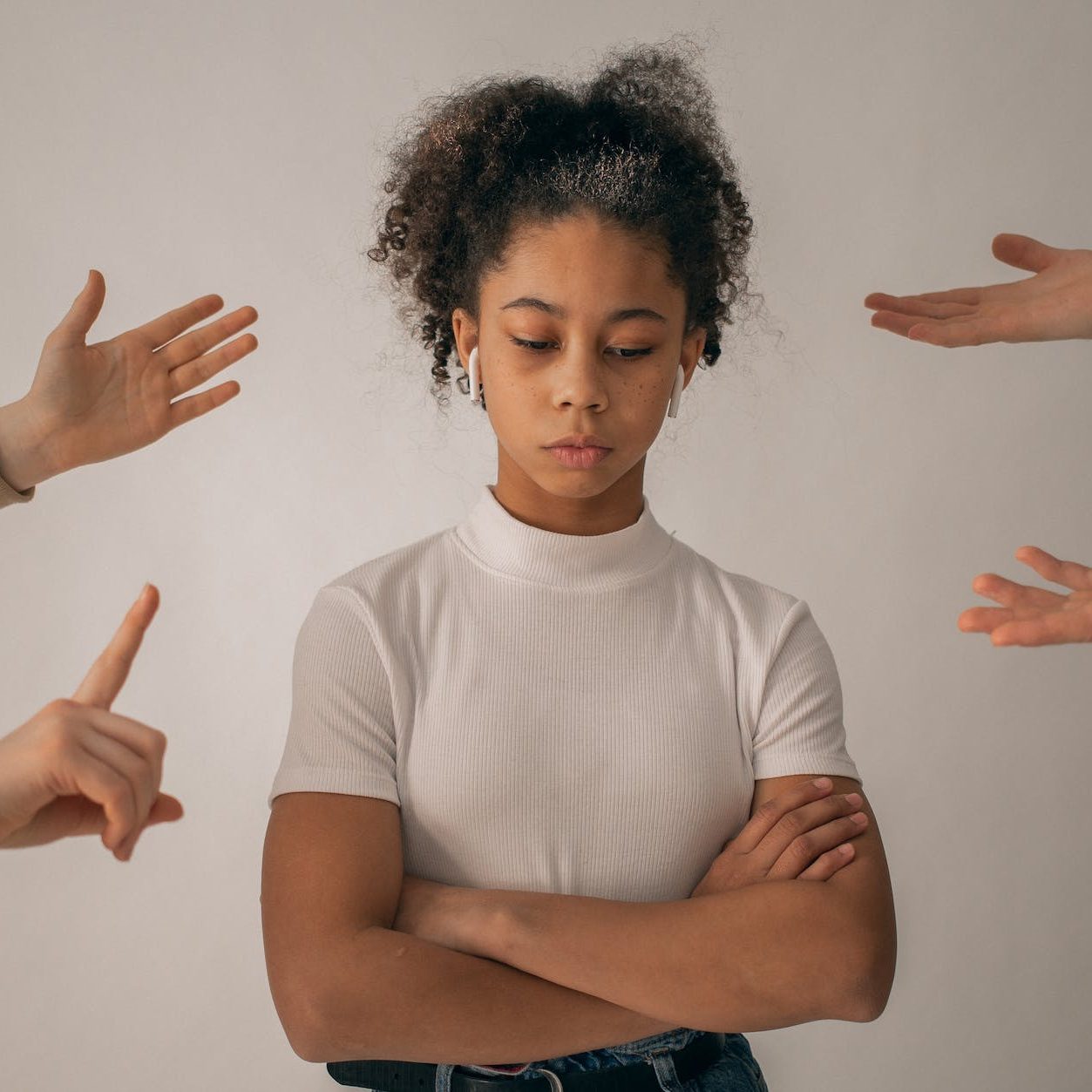 faceless people scolding discontent black girl